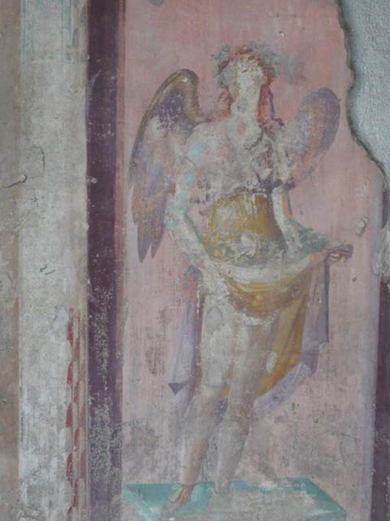 V.1.18 Pompeii. May 2012. West wall of exedra “y”, north end.   Detail of wall painting of a winged figure possibly a muse. Photo courtesy of Buzz Ferebee.