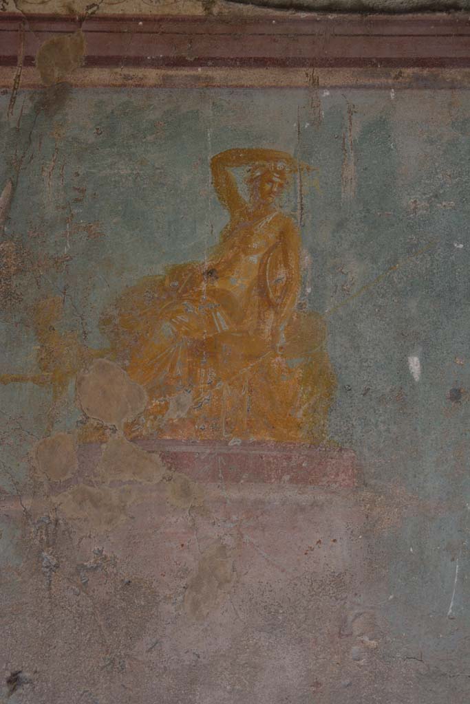 V.1.18 Pompeii. October 2019. 
Exedra “y”, painting of golden seated figure in centre of east wall of exedra “y”, described as both Dionysus, or perhaps Arianna.
Foto Annette Haug, ERC Grant 681269 DÉCOR.