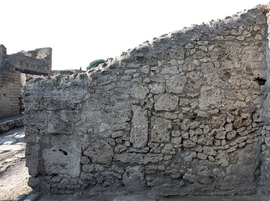 V.1.20 Pompeii. 2001. North wall of shop-room. Photo by Hans Thorwid.
According to Boman and Nilsson –
“A large rounded cutting at the western end may have accommodated a large jar, presumably in an earlier phase.
Once decorated with the 4th style painting of a Bacchus with panther (Mau 1875), no wall painting is preserved today.”
Photo and words courtesy of The Swedish Pompeii Project.