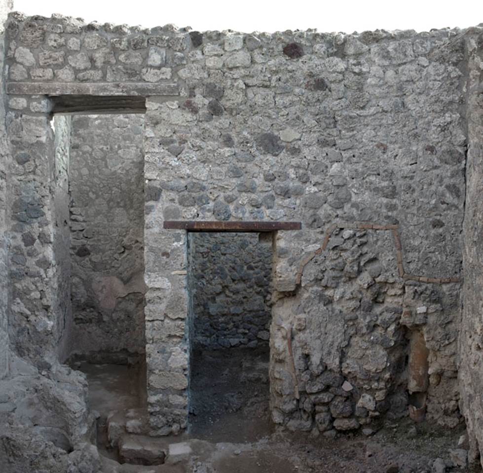 V.1.20 Pompeii. 2012.  Room “d”. Photo by Hans Thorwid.
“East wall of kitchen in 2012 after restoration in 2008. 
Restored parts of the wall photographed and merge with the lower part and floor line of earlier photos from 2005-07.”
Photo and words courtesy of The Swedish Pompeii Project.