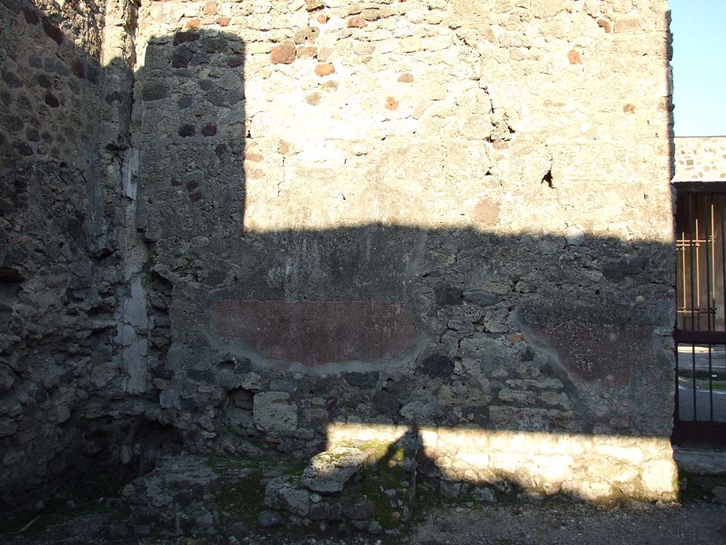 V.1.25 Pompeii. December 2006. East wall with base of steps to upper floor.