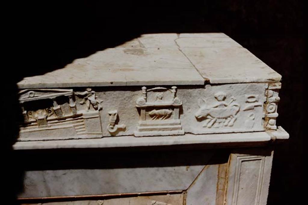 V.I.26 Pompeii. 1959. Marble slab with detail of scenes of the Forum in the earthquake of AD62, on side of household altar in atrium. Photo by Stanley A. Jashemski.
Source: The Wilhelmina and Stanley A. Jashemski archive in the University of Maryland Library, Special Collections (See collection page) and made available under the Creative Commons Attribution-Non Commercial License v.4. See Licence and use details.
J59f0437