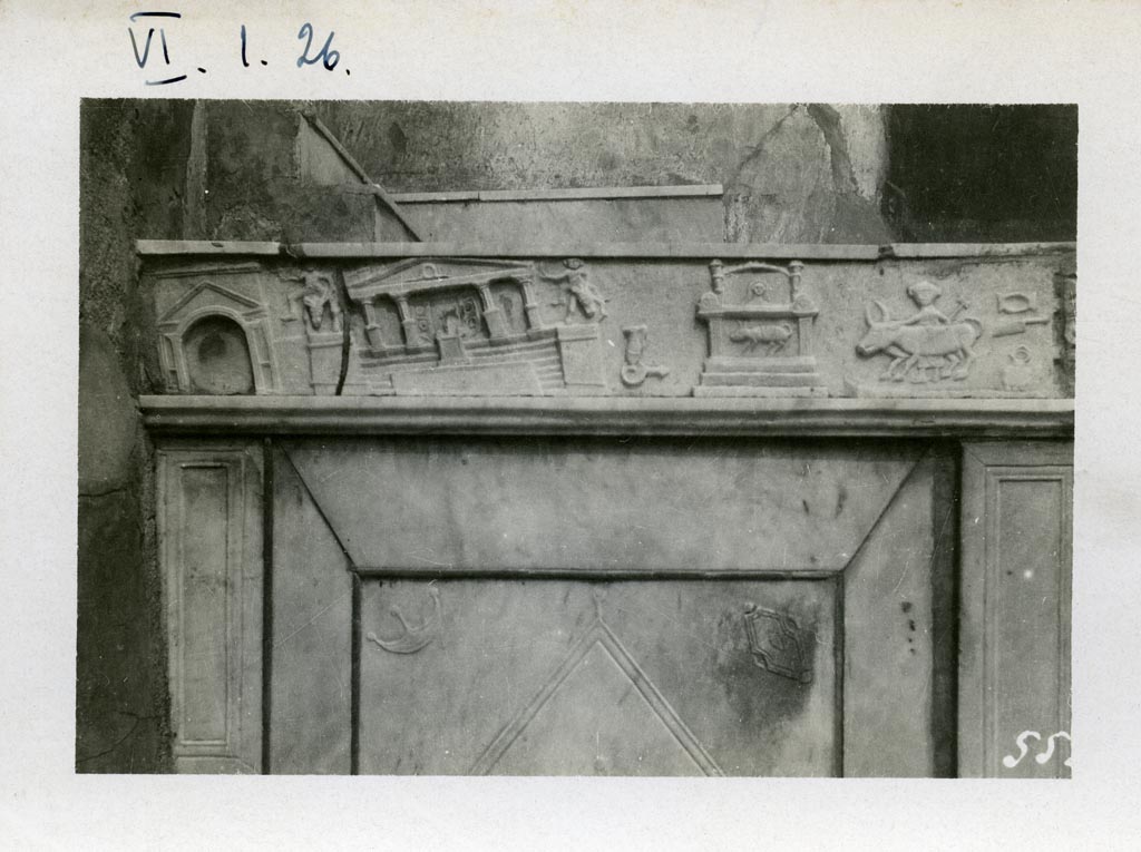 V.1.26 Pompeii, but numbered as VI.1.26 on photo. Pompeii. Pre-1937-39. 
Side of altar in atrium and marble slab with detail of scenes of the Forum in the earthquake of AD62. 
Photo courtesy of American Academy in Rome, Photographic Archive. Warsher collection no. 552.
