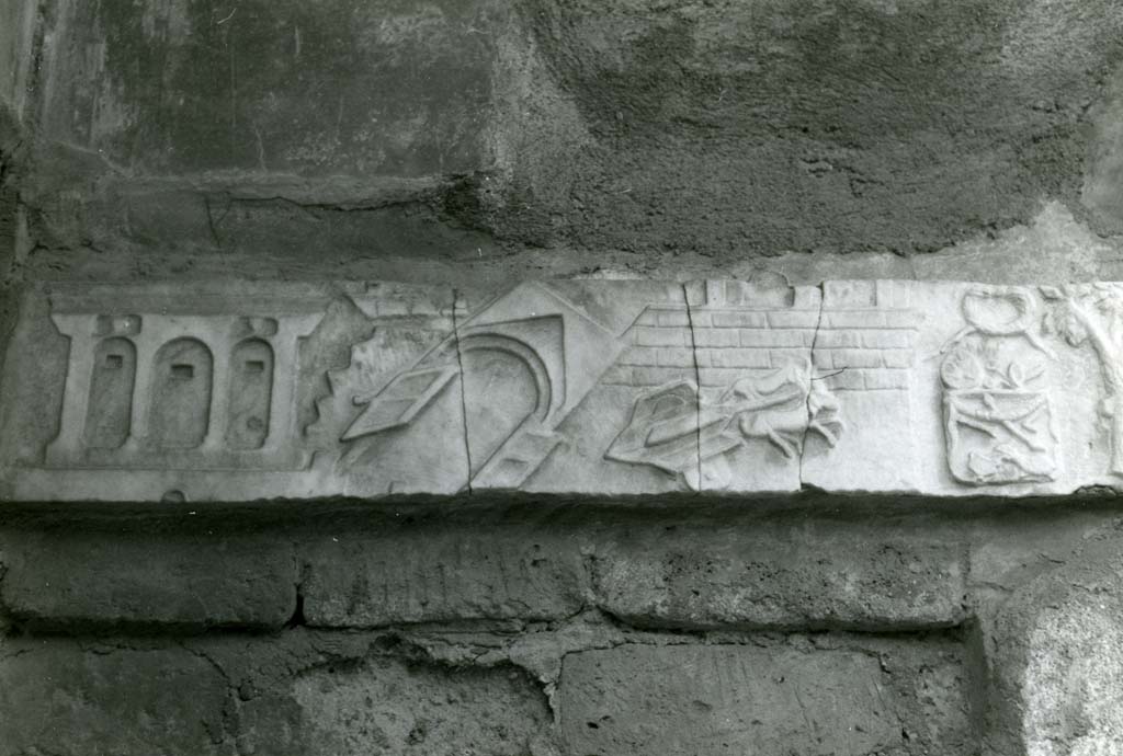 V.1.26 Pompeii. 1968. Domus L. Caecili Iucundi, Lararium earthquake frieze. Photo courtesy of Anne Laidlaw.
American Academy in Rome, Photographic Archive. Laidlaw collection _P_68_9_4.