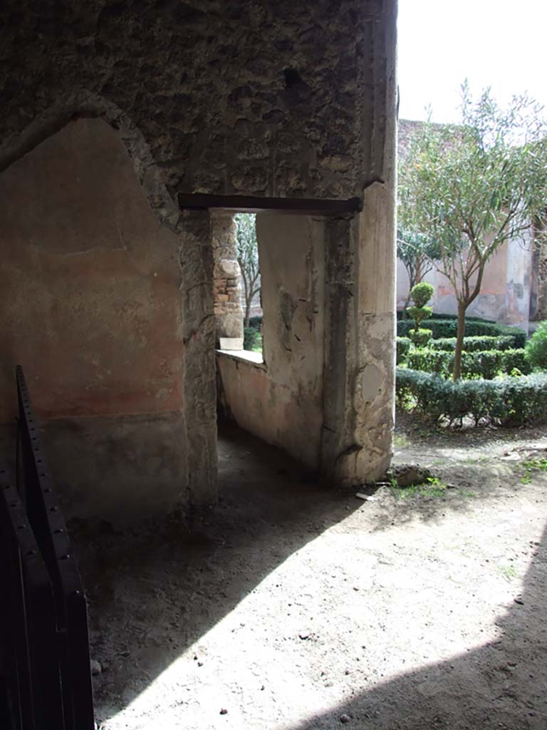 V.1.26 Pompeii. March 2009. 
Room “s”, looking towards doorway to room on east side of peristyle garden.