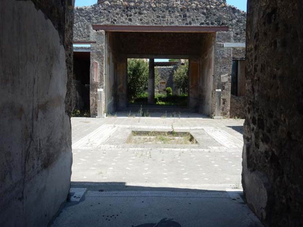 V.1.26 Pompeii. May 2017. Room “a”, looking east from entrance, through fauces to atrium “b”. Photo courtesy of Buzz Ferebee