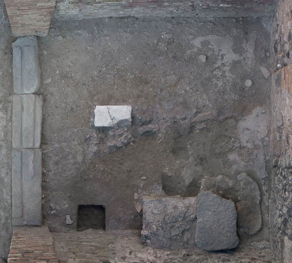 V.1.29 Pompeii. c.2011.  
Threshold of doorway, flooring and detail of hearth, from above. Photo by Hans Thorwid.
Photo courtesy of The Swedish Pompeii Project.