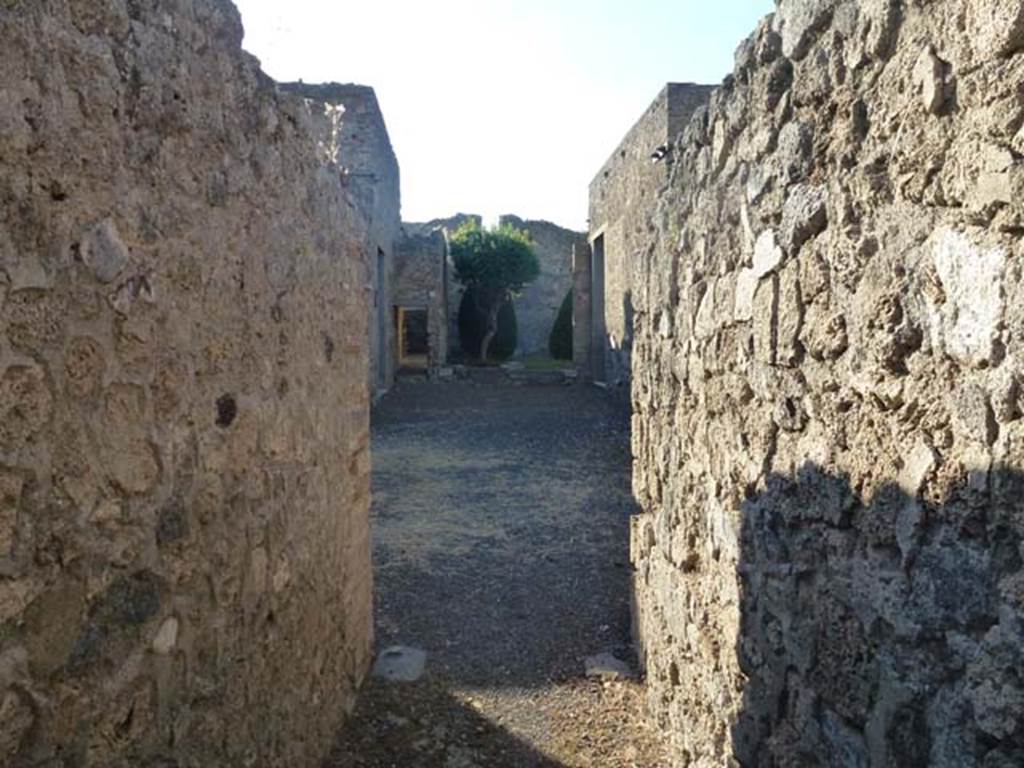 V.2.1 Pompeii. June 2012. Looking north from the entrance fauces across the atrium and impluvium to the garden area. Photo courtesy of Michael Binns.