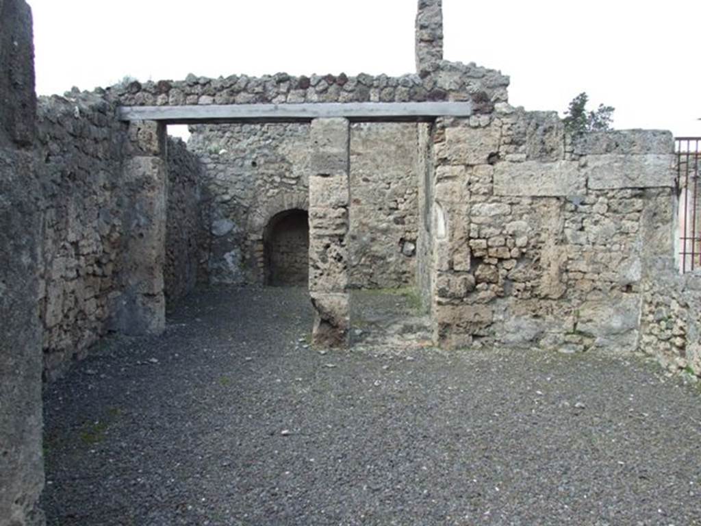 V.2.3 Pompeii.  March 2009.  Looking north across large caupona room, towards two rooms at rear.