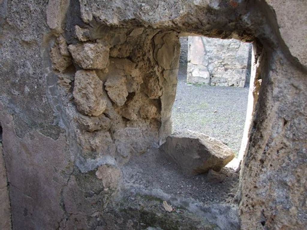 V.2.4 Pompeii. December 2007. Window in west wall of room 8 looking into atrium.