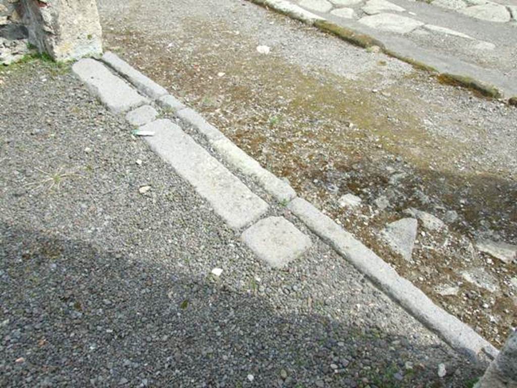 V.2.6 Pompeii. March 2009. Entrance doorway threshold or sill.