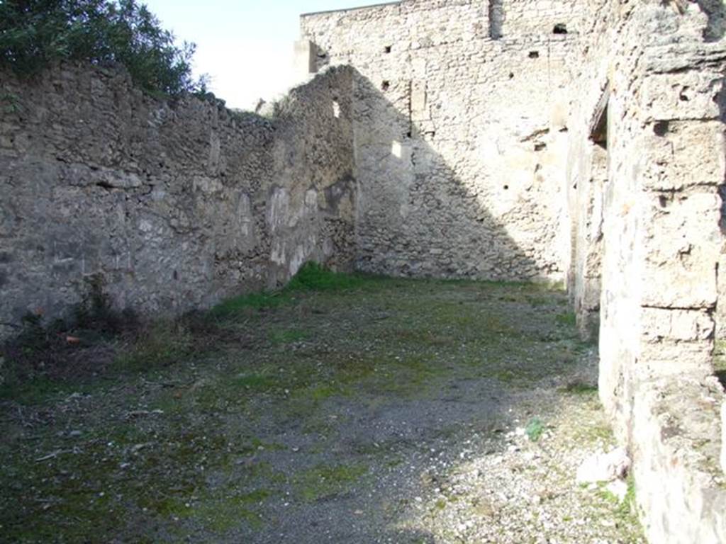 V.2.7 Pompeii. December 2007. Room 12, garden area. According to Jashemski, 15 amphorae were found in the garden.
See Jashemski, W. F., 1993. The Gardens of Pompeii, Volume II: Appendices. New York: Caratzas. (p.111)
According to PPM, the area around the garden area 11 and room 10, were protected by the roof that covered rooms 11, 13, 14 and 15 and also protruded out into the garden area, forming a sort of covered passage, even in the absence of a portico.
See Carratelli, G. P., 1990-2003. Pompei: Pitture e Mosaici, III. Roma: Istituto della enciclopedia italiana, p.824.
