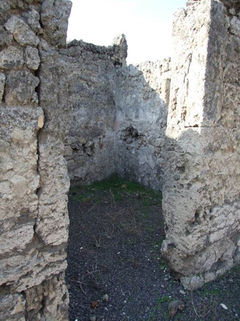 V.2.7 Pompeii. December 2007. 
Doorway to room 4, according to Mau “painted in the last style on a white background”.