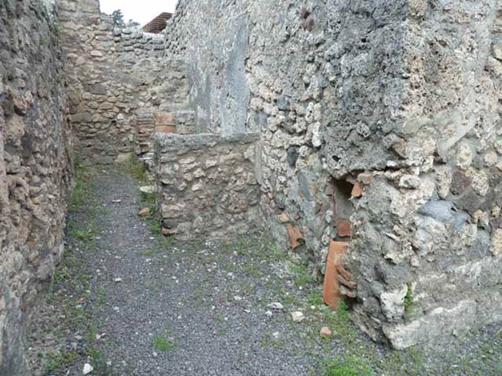 V.2.9 Pompeii. May 2010. Looking north in rear room. The north wall has a small window to V.2.10, and the site of stairs to upper floor against the east wall.