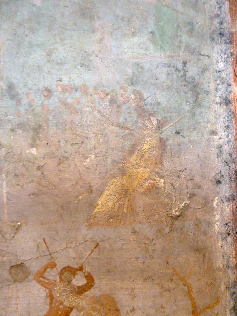 V.2.10 Pompeii. May 2010. Detail from wall painting from east wall of room 9, cubiculum.
Marsyas, playing the double flute, draws near to the procession of Muses led by Apollo who soon he will challenge in a musical contest.
Now in Naples Archaeological Museum. Inventory number 120626.