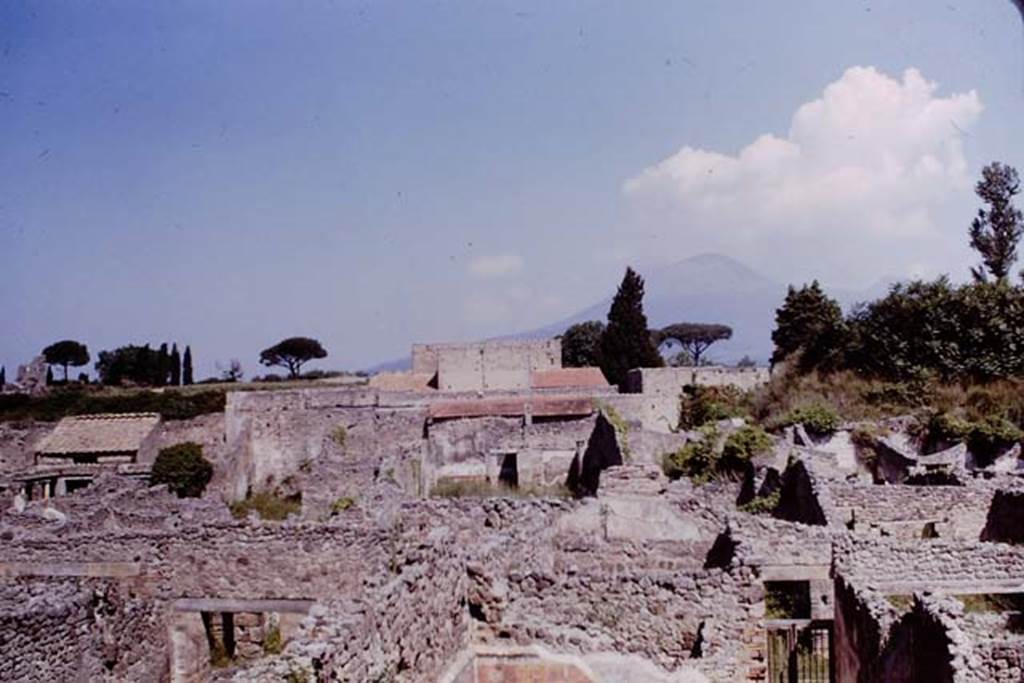 V.2.10 Pompeii, in centre.  Pompeii. 1964. Looking north from IX.5.   Photo by Stanley A. Jashemski.
Source: The Wilhelmina and Stanley A. Jashemski archive in the University of Maryland Library, Special Collections (See collection page) and made available under the Creative Commons Attribution-Non Commercial License v.4. See Licence and use details.
J64f1270