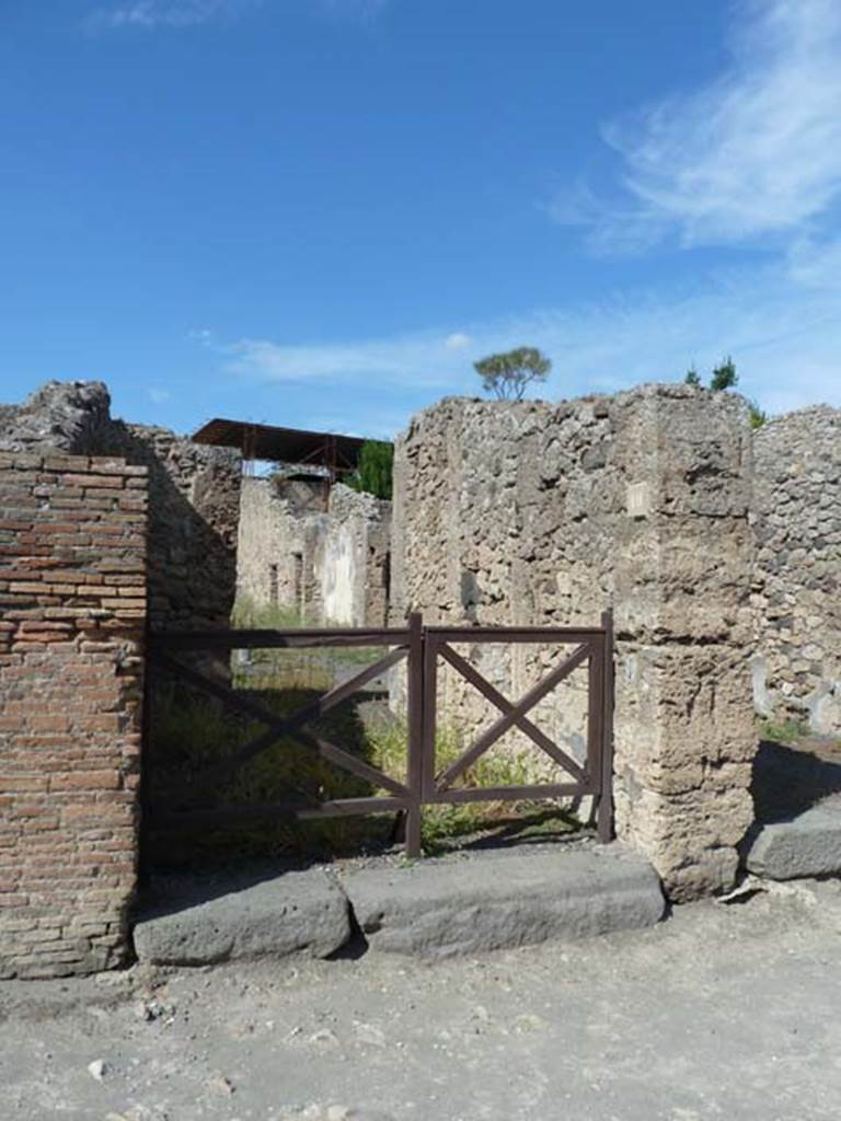 V.2.10 Pompeii. September 2015. Looking north to entrance doorway on Via di Nola.