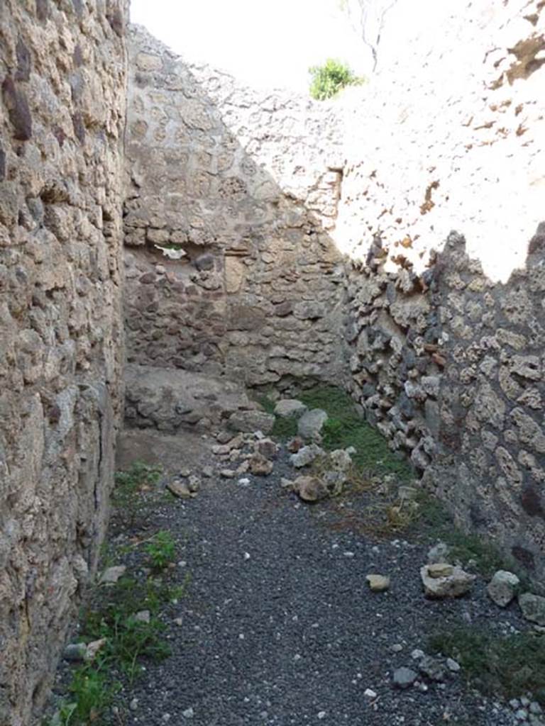 V.2.13 Pompeii. September 2015. Looking north across kitchen, with latrine.