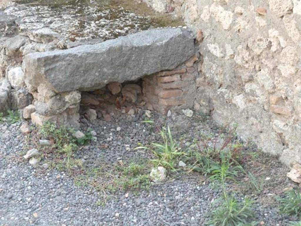 V.2.13 Pompeii. September 2015. Masonry hearth or base, in south-west corner of bar-room.