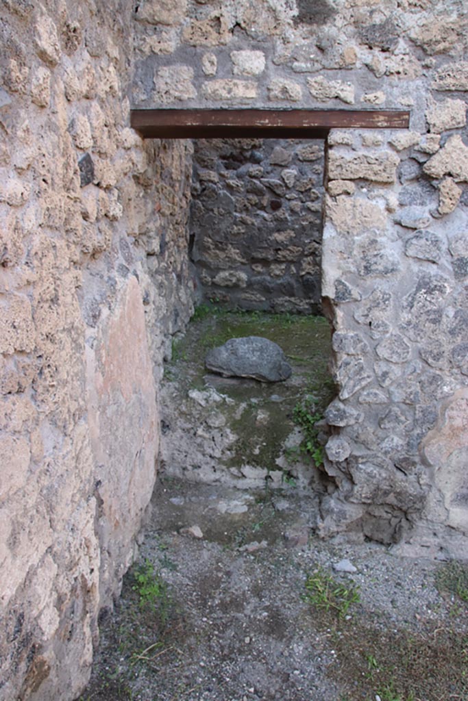 V.2.17 Pompeii. October 2022. 
Looking north through doorway into rear room. Photo courtesy of Klaus Heese.