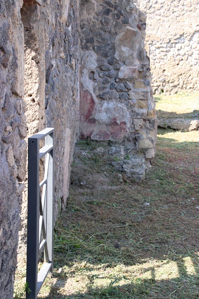 V.2.19 Pompeii. October 2022. 
Looking north along site of stairs along west wall, with doorway to V.2.17, on left.  
Photo courtesy of Klaus Heese.