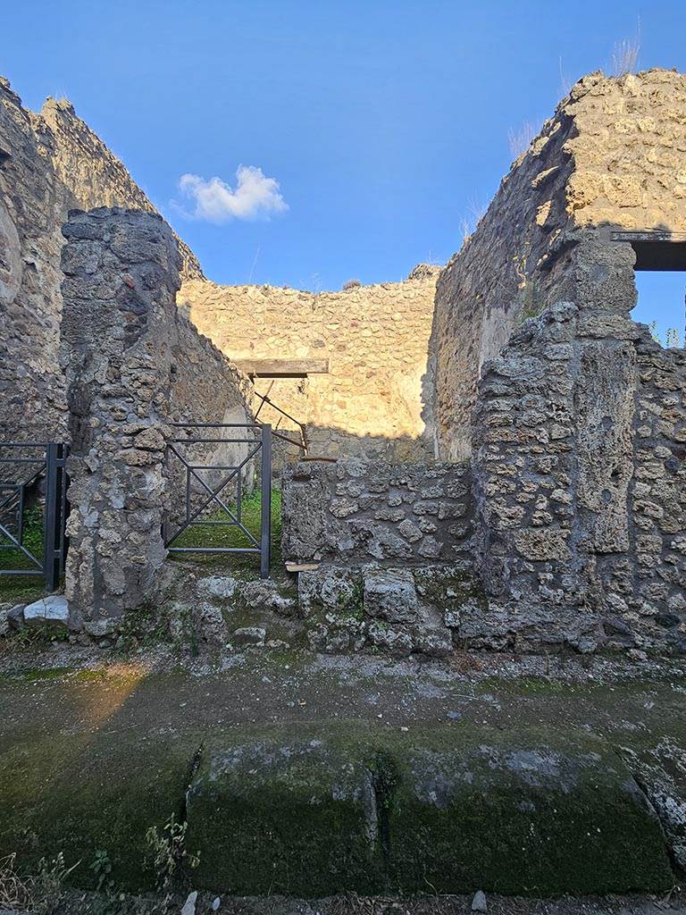V.2.b Pompeii. November 2024. 
Looking east towards entrance doorway to bar-room. Photo courtesy of Annette Haug.