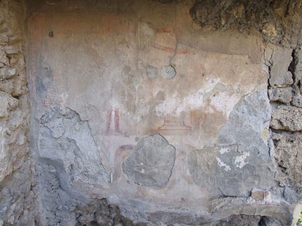 V.2.b Pompeii. December 2007. Remains of lararium painting on west wall of room “b” behind the bar.