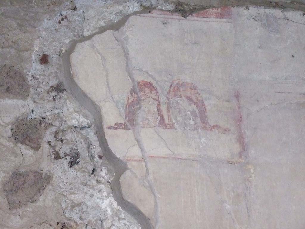 V.2.i Pompeii. December 2007. Room 23, painted masks on south side of Rhodian peristyle.