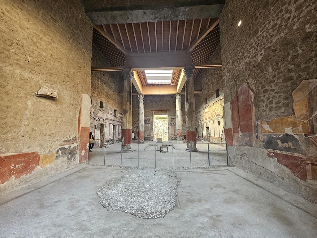 V.2.i Pompeii. November 2024. 
Room 7, tablinum looking north through atrium 1 towards entrance doorway. Photo courtesy of Annette Haug.