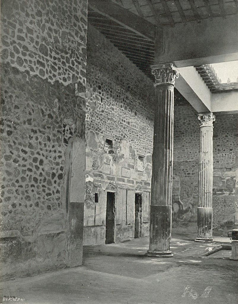V.2.i Pompeii. c.1908-1909. Looking south-east across atrium from entrance corridor.
According to Sogliano –
“It is true that since 1893 the capitals and sections of the four columns of the tetrastyle atrium of this house, which are amongst the tallest found in Pompeii, measuring 7.12m, were collected and relocated in situ; but from that time to 1907 it was necessary to suspend any further excavation in this part of the ancient city, since the adjoining land had not yet returned to the possession of the Administration.
Having restored those lands to us, I set my hand to the excavation of the noble house, and proceeded at the same time to restore the peristyle, the alae, and the oecus corinthium.
I mentioned this in my past report, promising that I would redo the roof of the great tablinum and proceed to restore the majestic tetrastyle atrium.”
See Sogliano, A., 1909. Dei lavori eseguiti in Pompei dal i Luglio 1908 a tutto Giugno 1909. Napoli: d’Auria, (p.15/16, fig.2).