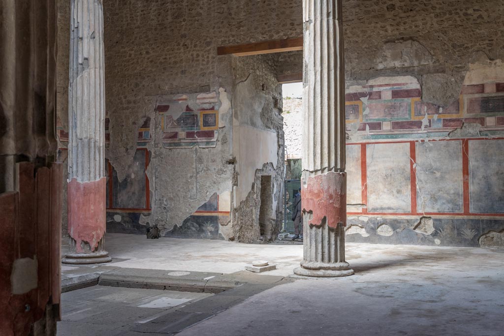 V.2.i Pompeii. March 2023. 
Room 1, looking north-west across atrium towards entrance corridor and small doorway to room 2. Photo courtesy of Johannes Eber.