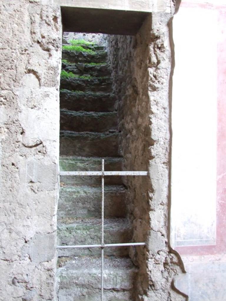 V.2.i Pompeii.  December 2007.  Room 1, Atrium, East side.  Stone staircase in atrium between room 3 and room 4.