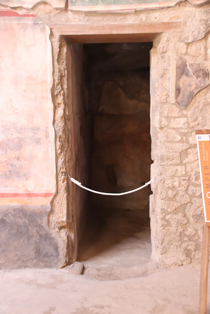 V.2.i Pompeii. October 2023. 
Room 1, doorway to room 2a, on west side of atrium. Photo courtesy of Klaus Heese.
