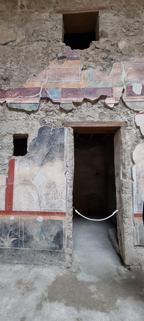 V.2.i Pompeii. December 2023. 
Room 2c, doorway on west side of atrium. Photo courtesy of Miriam Colomer.