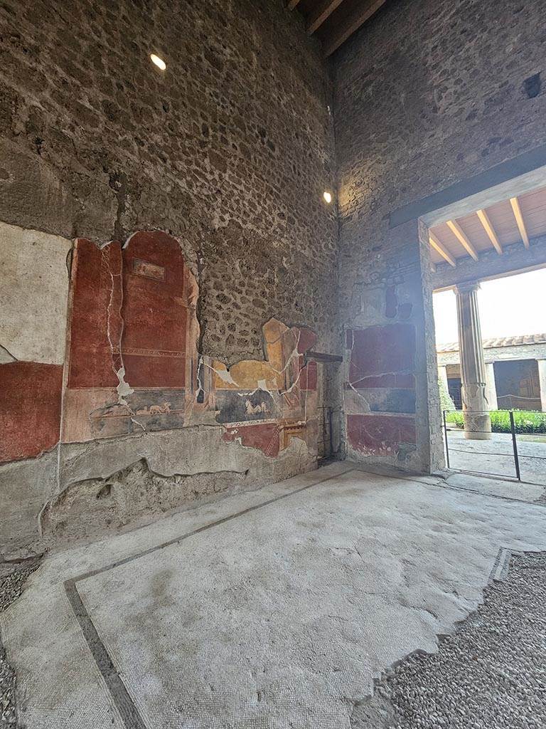 V.2.i Pompeii. November 2024. 
Tablinum 7, looking south along east wall. Photo courtesy of Annette Haug.