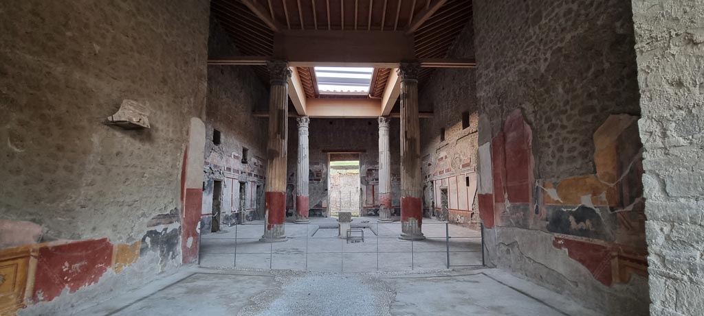 V.2.i Pompeii. December 2023. 
Room 1, looking north across atrium with compluvium, from room 7, tablinum. Photo courtesy of Miriam Colomer.