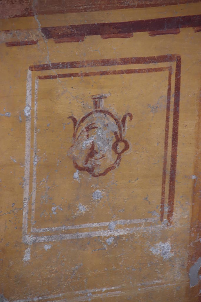 V.2.i Pompeii.  October 2023. 
Tablinum 7, detail from zoccolo with yellow panel on lower south end of west wall.
Photo courtesy of Klaus Heese.