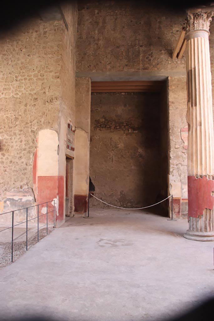 V.2.i Pompeii.  October 2023. 
Room 1, south side of atrium, looking towards west ala 8.
The tablinum is on left, followed by doorway to corridor 10. Photo courtesy of Klaus Heese.