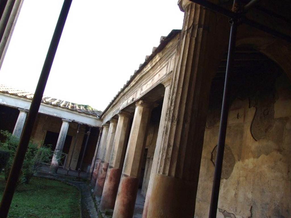 V.2.i Pompeii. December 2007. Room 23, looking south along the west side of Rhodian peristyle.