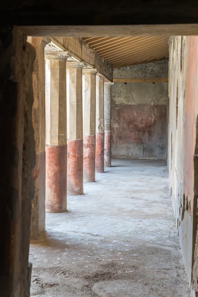 V.2.i Pompeii. March 2023. 
Room 23, looking south along west portico. Photo courtesy of Johannes Eber.