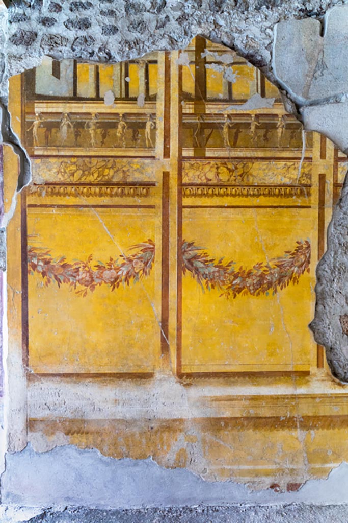 V.2.i Pompeii. March 2023. 
Room 19, east wall of exedra at north end. Photo courtesy of Johannes Eber.
