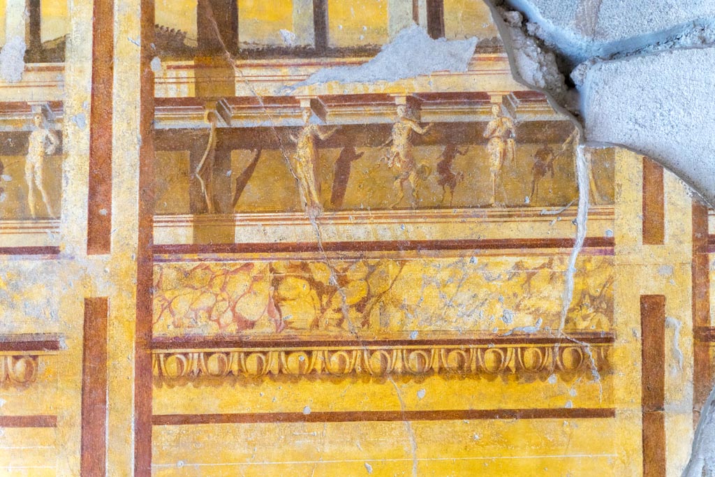 V.2.i Pompeii. March 2023. 
Room 19, detail of upper east wall of exedra at north end. Photo courtesy of Johannes Eber.