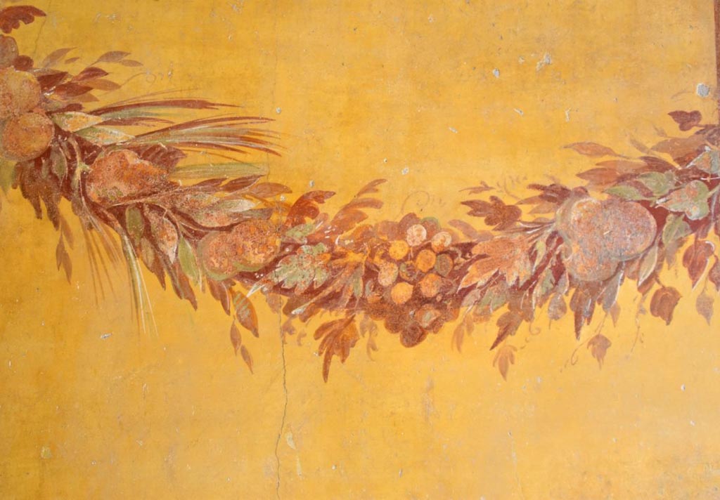 V.2.i Pompeii. July 2023. Room 19. Detail from west wall. 
Photograph © Parco Archeologico di Pompei.