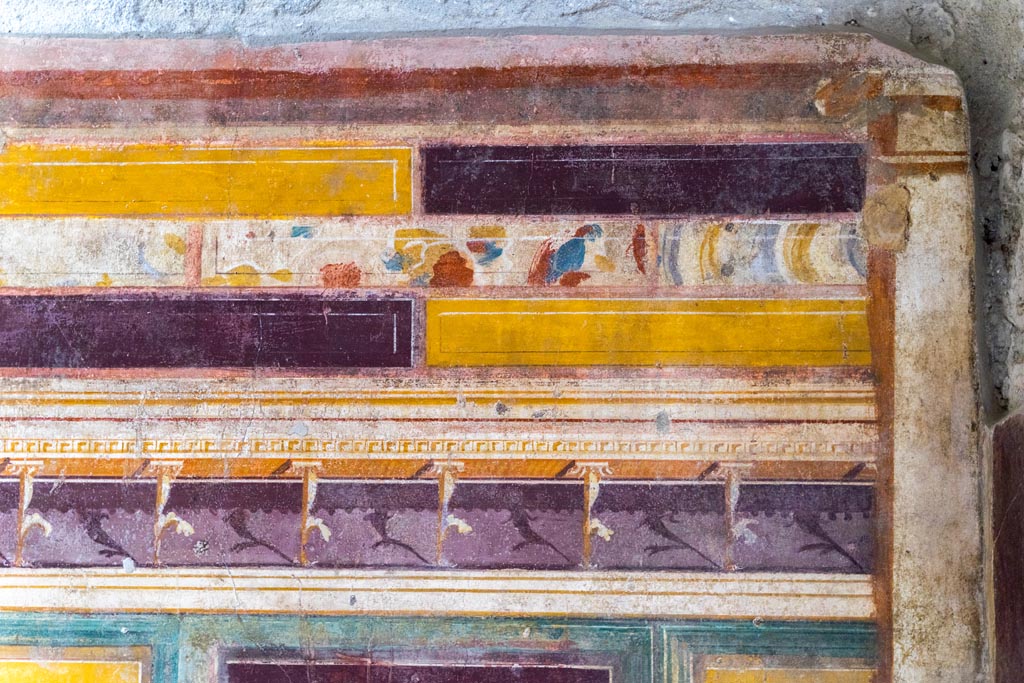 V.2.i Pompeii. March 2023. 
Room 20, detail from upper west wall at north end. Photo courtesy of Johannes Eber.