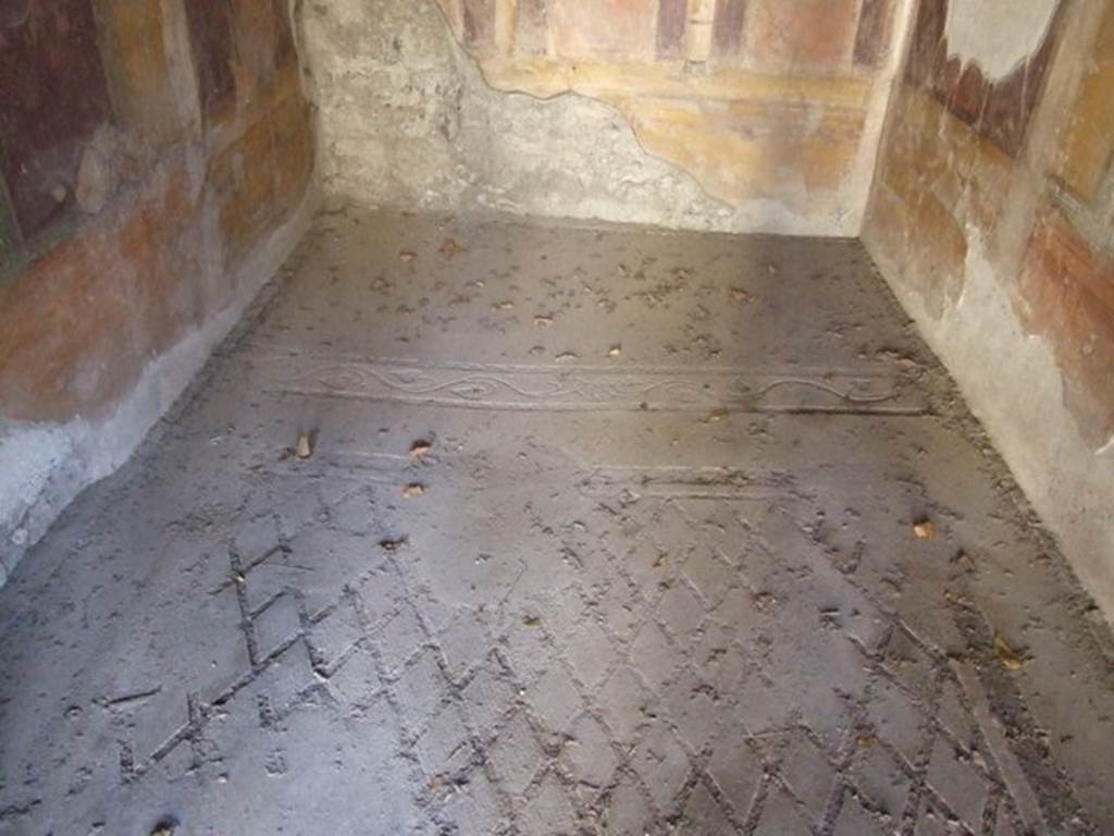 V.2.i Pompeii.  December 2007.  Room 20.  Bedroom or small dining room?  
Mosaic floor showing difference between front area and rear are where a couch would have stood.
