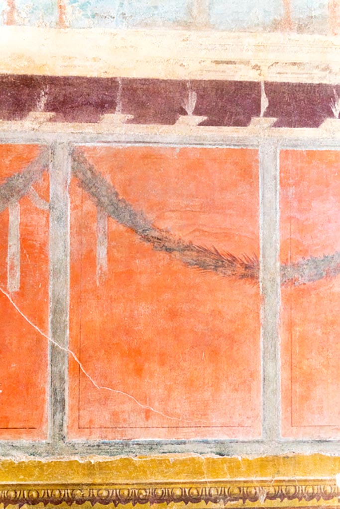 V.2.i Pompeii. March 2023. 
Room 21, Corinthian oecus, detail of painted panel on south wall. Photo courtesy of Johannes Eber.