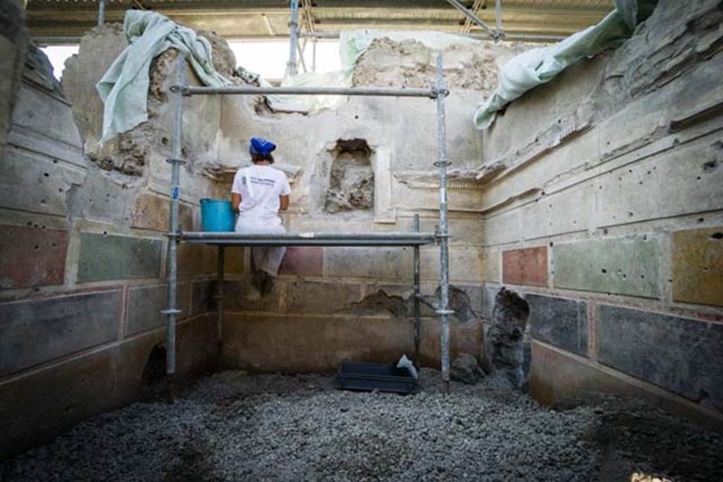 V.2.15 Pompeii. August 2018. Room A11 in centre of south side of atrium A12. Restoration in progress in 1st style room of 2nd C BC.
The holes from the Bourbon tunnel can be seen in the east and west walls.
Photograph © Parco Archeologico di Pompei.