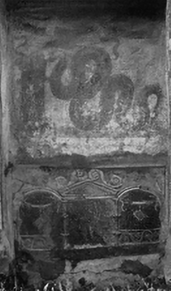 V.3.7 Pompeii. Pre-1937. Detail of interior of aedicule lararium and niche. 
The lararium lower zone had red plaster with an aedicula façade within which stood the painted figure of Ceres.
She was wearing a crown of ears of grain and held a torch in her left hand and a sheaf of grain in her right.
Boyce contrasts the delicacy of this painting with the coarser and more familiar lararium art above.
See Boyce G. K., 1937. Corpus of the Lararia of Pompeii. Rome: MAAR 14.  (112, p. 38, Pl 36, 2).