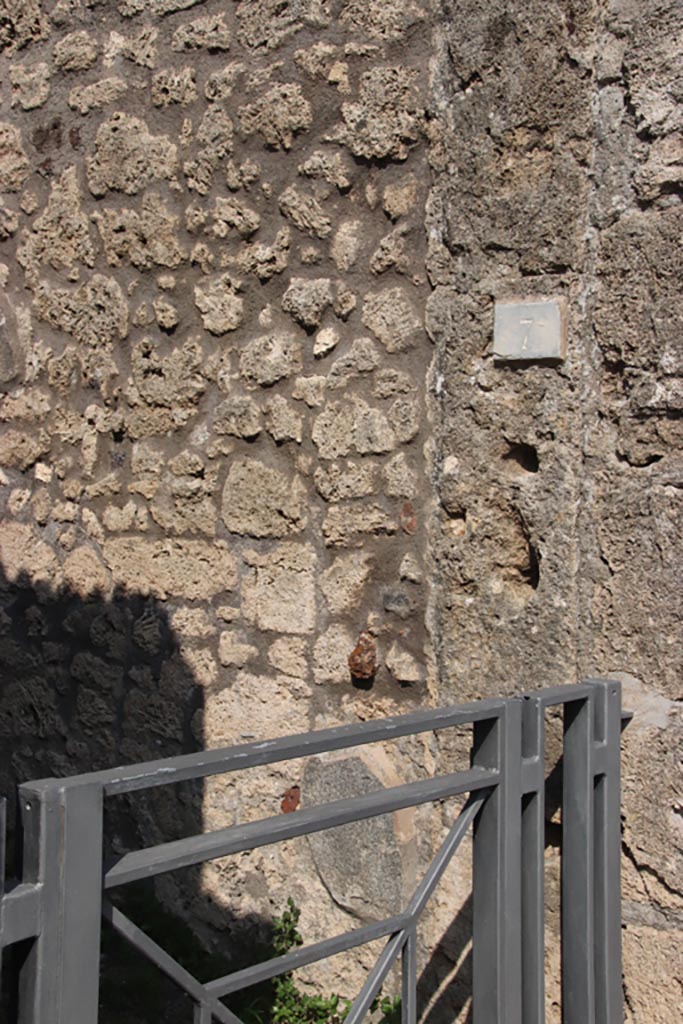 V.3.7 Pompeii. October 2023. 
Looking east to entrance doorway on Via di Nola. Photo courtesy of Klaus Heese.