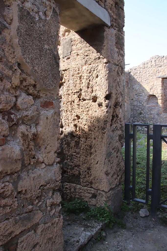 V.3.8 Pompeii. October 2023. 
Doorway to small room on west side of entrance corridor. Photo courtesy of Klaus Heese.